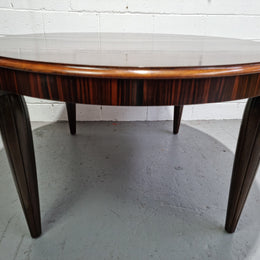 French Art Deco Macassar Ebony circular dining table by "Jules Leleu". In very good original detailed condition.