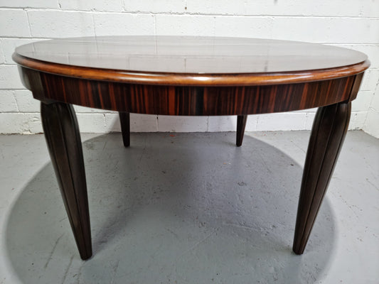French Art Deco Macassar Ebony circular dining table by "Jules Leleu". In very good original detailed condition.