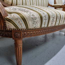 French carved Walnut Louis XV style settee and two matching armchairs. They are in good condition with upholstery also in good condition.