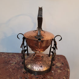 Art Nouveau style rustic Copper kettle on stand. Decorative only.