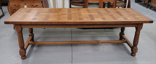 French Oak Refectory dining table with a parquetry top. Sourced from France this table comfortably sits eight to ten. It is in good original detailed condition.