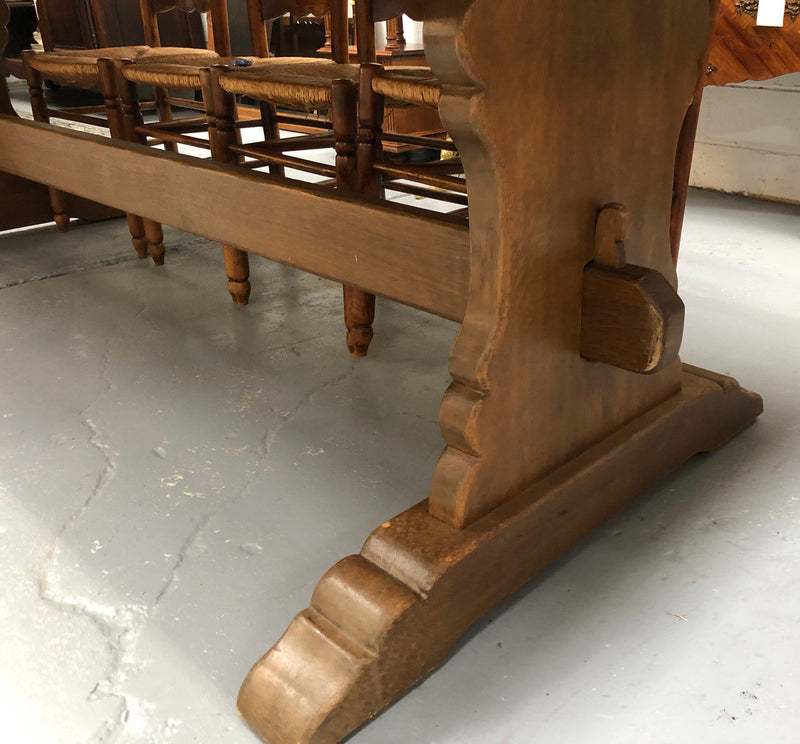 Lovely long French light oak Farmhouse table with a good thick plank top and beautiful stretcher base. Can seat 12 people very comfortable and is in good original condition.