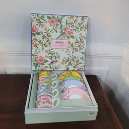 Contemporary “Aynsley Regal Pembroke” boxed set of four English Bone China cup and saucer. Beautiful patterns and vibrant colours.