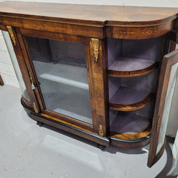 Victorian Rosewood inlaid side cabinet/credenza with velvet lined shelves and gilt mounts. It has been sourced locally and is in good original condition with loads of character.
