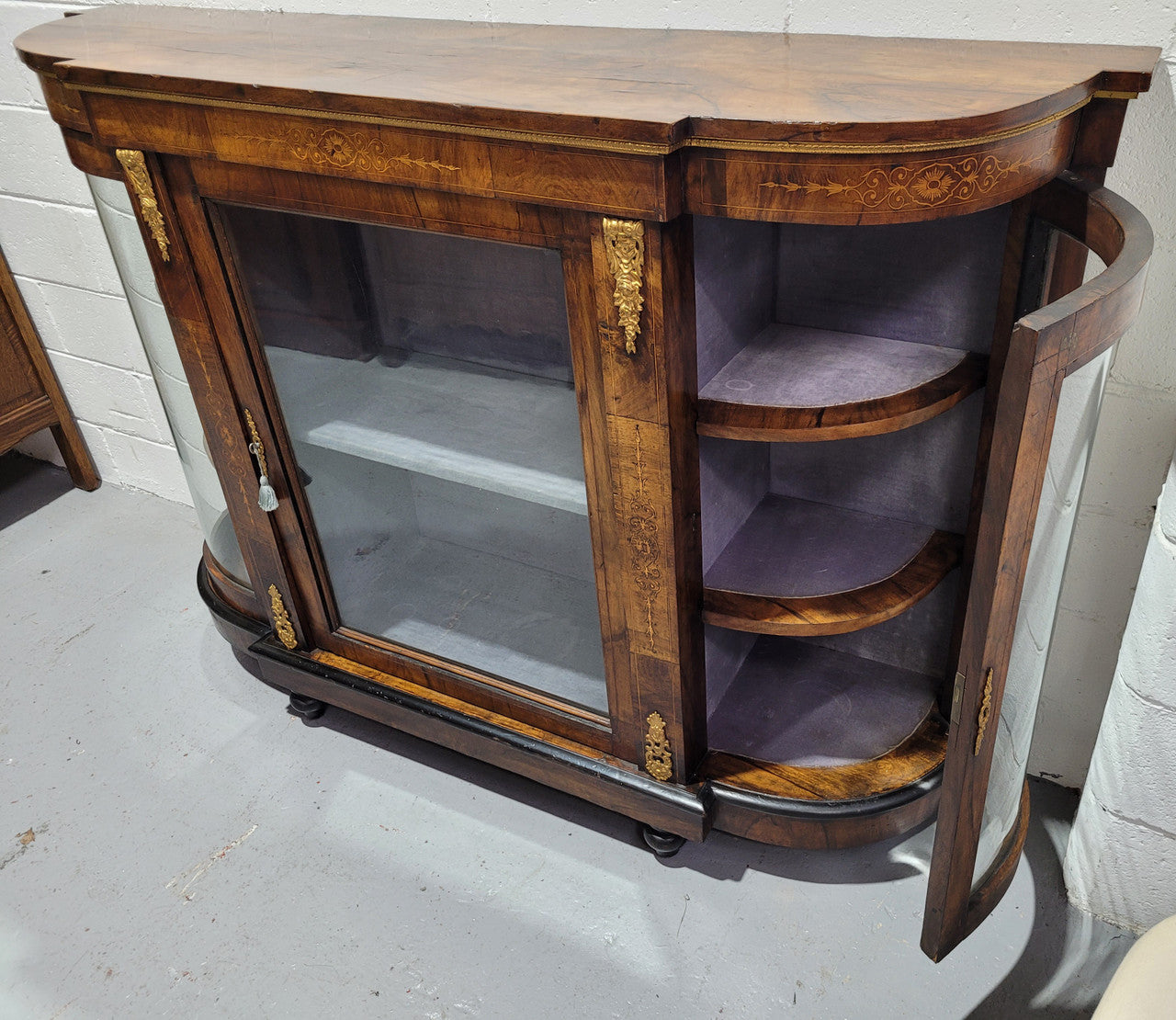 Victorian Rosewood inlaid side cabinet/credenza with velvet lined shelves and gilt mounts. It has been sourced locally and is in good original condition with loads of character.