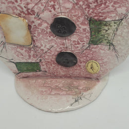 Signed pastel ceramic Italian clown figure. In good original condition.