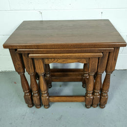 Vintage nest of three French Oak tables. In very good original detailed condition.