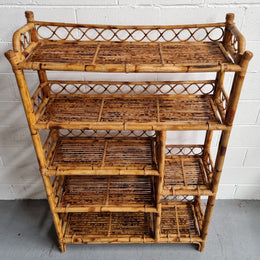 Vintage Tortoiseshell Bamboo Shelves.  Good size unit with irregular shelves. It is in good original condition and it very solid.