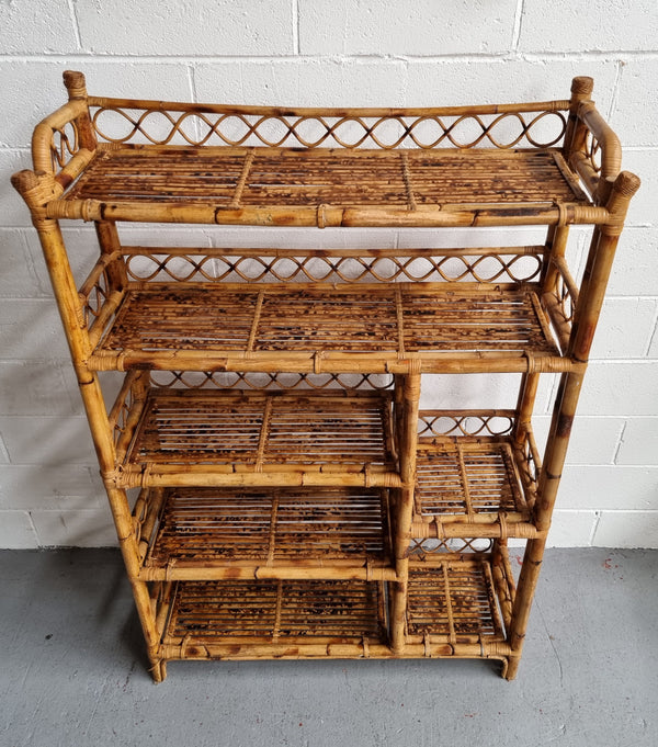 Vintage Tortoiseshell Bamboo Shelves.  Good size unit with irregular shelves. It is in good original condition and it very solid.