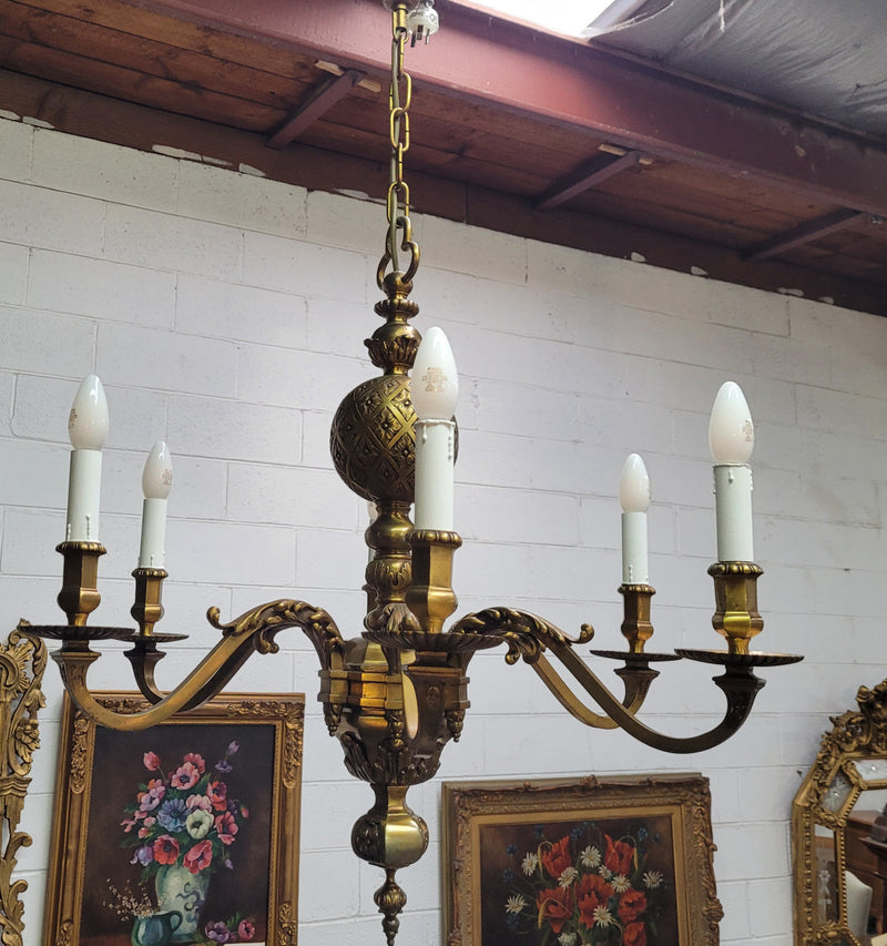 Stunning six arm French bronze chandelier. It can be used with or without shades. It has been fully rewired to Australian standards. It is in good original detailed condition.