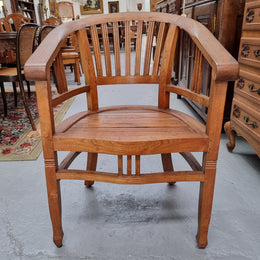 Vintage teak "Captains Chair". It is well built and very comfortable to sit in. It is in good original detailed condition.