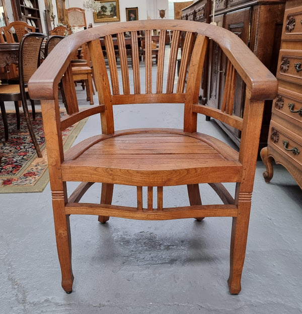 Vintage teak "Captains Chair". It is well built and very comfortable to sit in. It is in good original detailed condition.