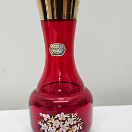 Lovely Bohemian ruby red glass vase with hand painted flowers and a guilt trimmings. It is in good original condition. Please see photos as they form part of the description.