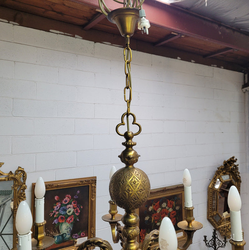 Stunning six arm French bronze chandelier. It can be used with or without shades. It has been fully rewired to Australian standards. It is in good original detailed condition.