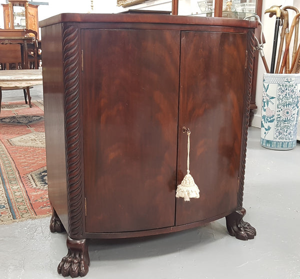 Antique Flame Mahogany Claw Foot Shoe Cupboard