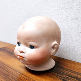 Large Bisque Dolls Head with beautiful blue eyes.  Marked on the back of the neck "Copy By Grace S utnam Made in Germany"  no chips or cracks please see photos as they form part of the description.