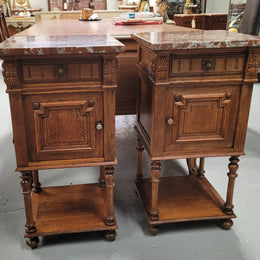 Pair French Oak Henry II style rouge marble topped bedside cabinets. Consisting of one drawer, one cupboard and a bottom shelf. Carved decoration and turned legs. Circa: 1900's.