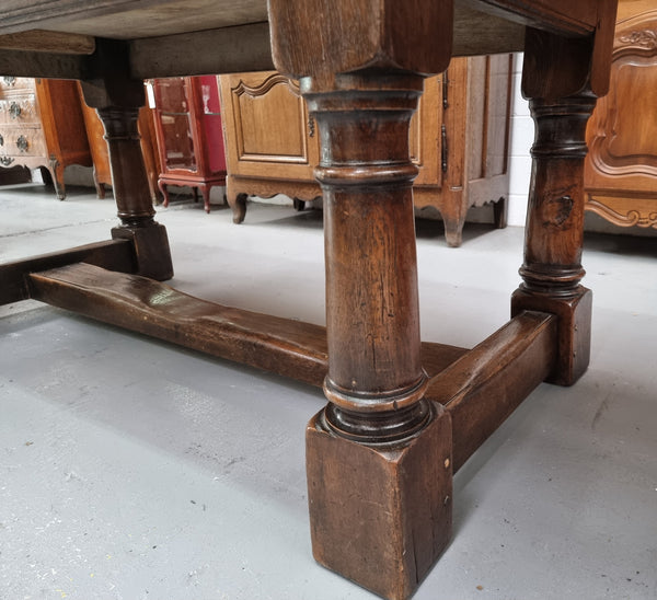 Lovely vintage French dark Oak pedestal base Farmhouse table. It can comfortable sit eight and it is in good original condition.