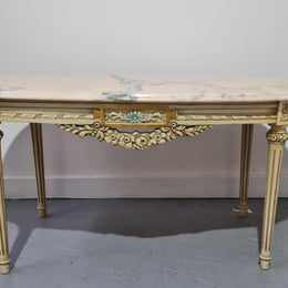 Charming painted Louis XVI style oval marble top coffee table. In good original detailed condition.