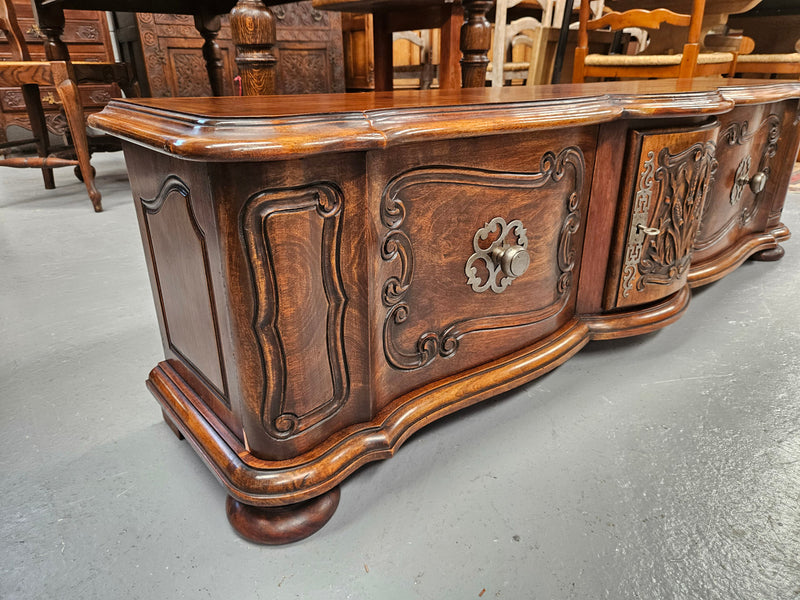 Appealing French Louis XVth style walnut converted TV unit.  Central carved  door & 2 Sliding Cupboards. In good condition.