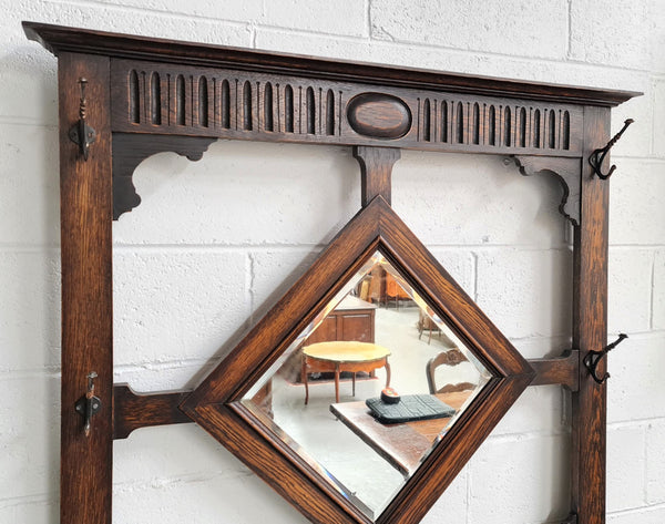 Beautiful Oak Antique Jacobean hall stand, with barley twist leg and a drawer for storage in very good original detailed condition condition.