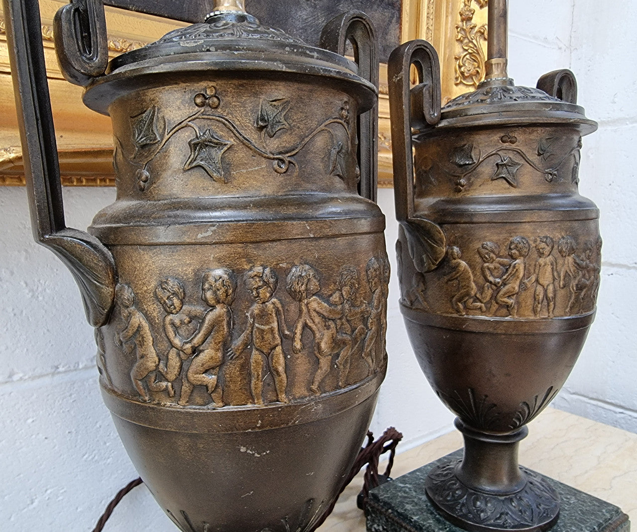Antique pair of beautiful French urns on marble table\bedside lamps. In good original detailed working condition .