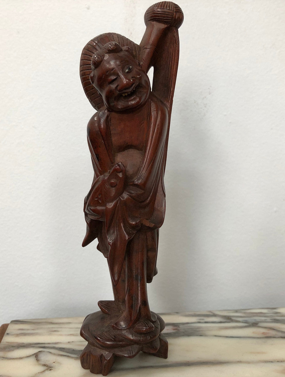 Vintage Chinese carved rosewood figure on wooden stand. In good original condition.