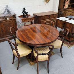 William IV Rosewood tilt top round table with six Rosewood chairs. It has been sourced from locally and is in good original detailed condition.