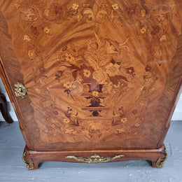 Elegant French transitional style Walnut & Kingwood Salon cabinet. It has beautiful marquetry inlay, a marble top and decorative ormolu mounts. Sourced From France and is in good original detailed condition.