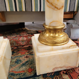 Pair of Imposing French alabaster marble and bronze pedestals. They are highly decorative and have been sourced from France. They are in good original detailed condition.
