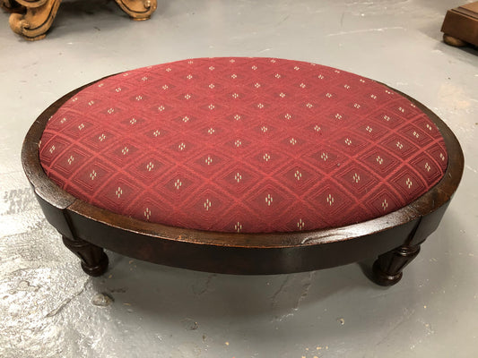 Upholstered Antique Mahogany oval foot stool. In very good original condition.