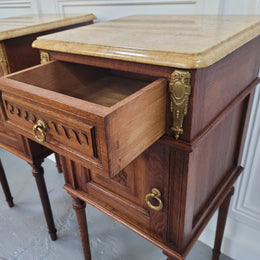 French Oak pair of Louis 16th style marble top bedsides with stunning bronze mounts. They have been sourced from France and are in good original detailed condition.