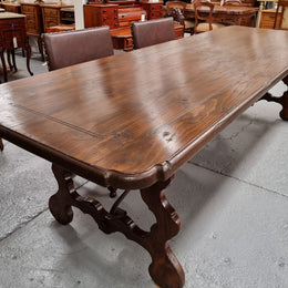 Amazing hard to find French Fruitwood Spanish style 3 meter dining table. Decorative iron work underneath and in good detailed original condition.