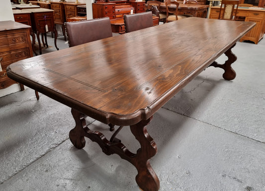 Amazing hard to find French Fruitwood Spanish style 3 meter dining table. Decorative iron work underneath and in good detailed original condition.