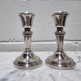 Pair of Birmingham sterling silver candlesticks date marks 1967. In good original condition, please view photos as they help form part of the description.