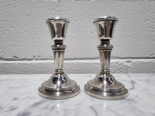 Pair of Birmingham sterling silver candlesticks date marks 1967. In good original condition, please view photos as they help form part of the description.