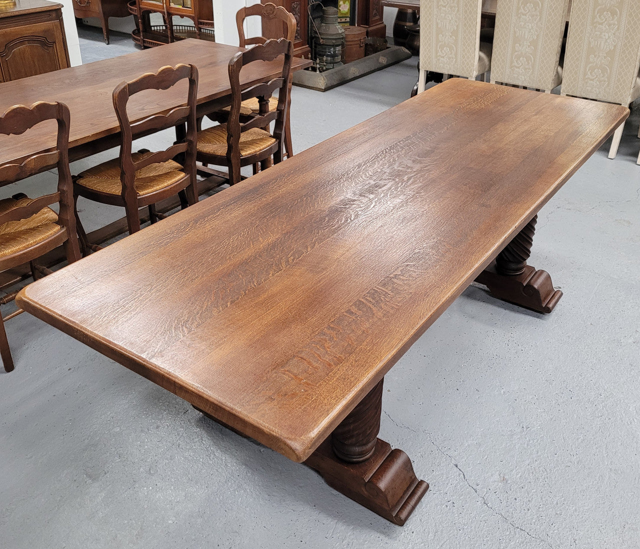 Amazing French Oak Spanish Renaissance style dining table with beautiful decorative iron work. It has been sourced from France and can comfortable seat 8- 10 people. Sourced from France and is good original detailed condition.
