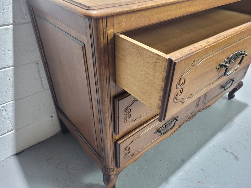 Louis XV style French Oak chest of three drawers that has been sourced from France. It is in good original condition and has been detailed.