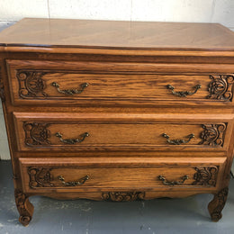 Gorgeous Provincial oak and parquetry top commode. It has beautiful carved Details and in good original detailed condition.