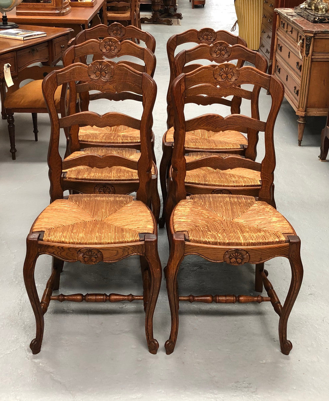 Set of six French rush seat dining chairs and in good sturdy condition.
