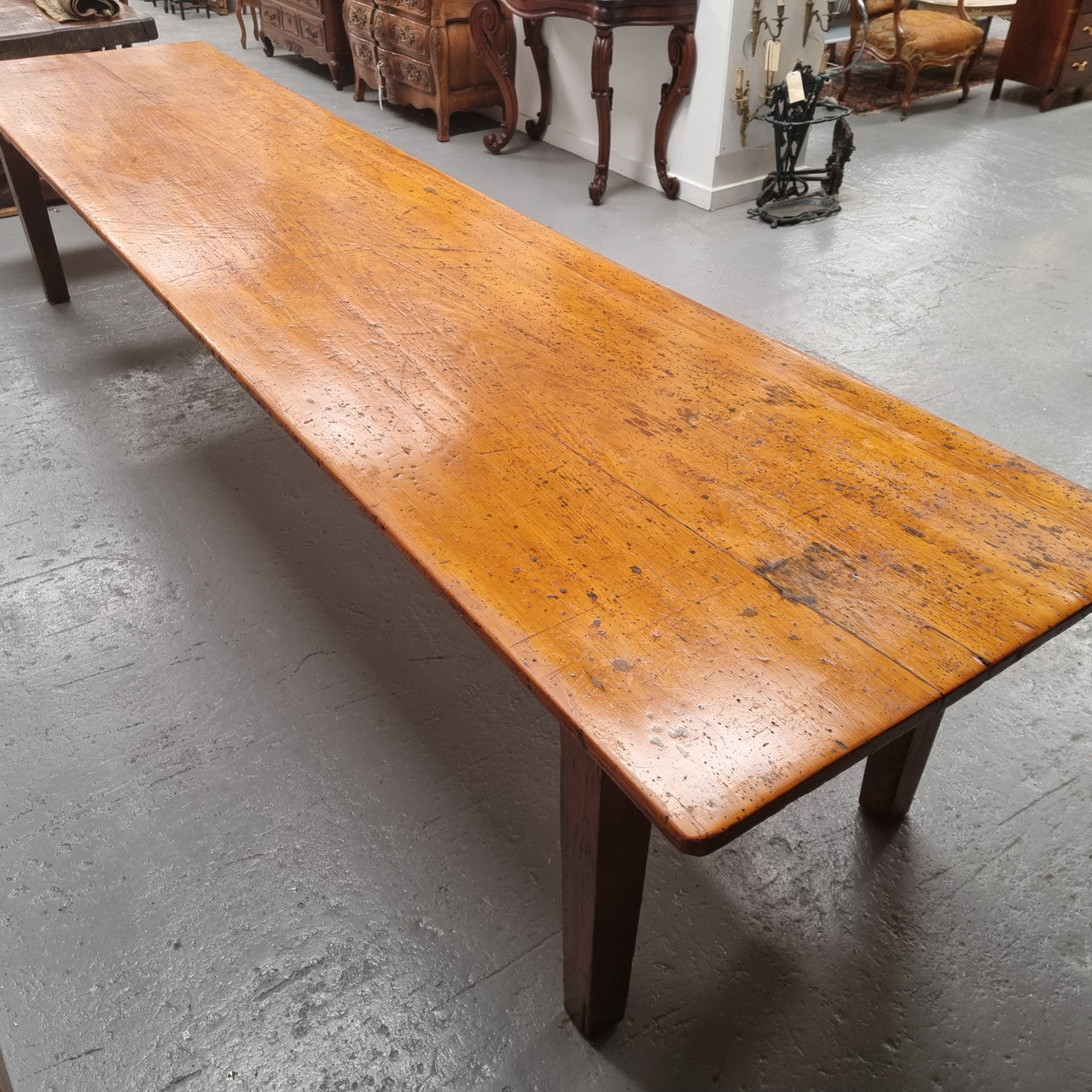 Extremely rare one piece top Kauri Pine Australian farmhouse table. It is truly an amazing table with loads of character, it comfortably seats 14 to 16 people. In good original detailed condition and sourced locally.