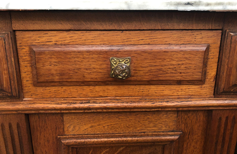 A lovely pair of French Oak, marble top bedside cabinets with a cupboard and drawer in good original condition.