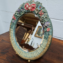 Beautifully decorated Barbola round bevelled edge mirror. In good original condition.