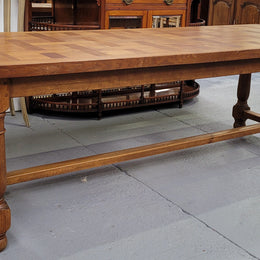 French Oak Refectory dining table with a parquetry top. Sourced from France this table comfortably sits eight to ten. It is in good original detailed condition.