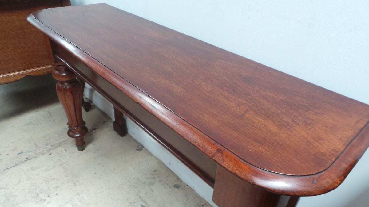 A Matching Pair Antique Console Tables