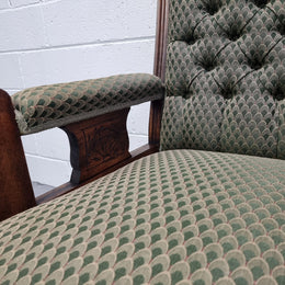 Pair of Edwardian button back Walnut armchairs. They are in good original condition with clean upholstery.