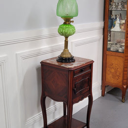 French Rosewood inset marble top single bedside cabinet with one drawer and one cupboard on elegant legs. Would also make a practical and stunning table lamp. It is in good original detailed condition.