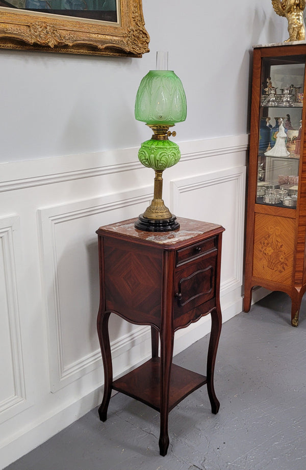 French Rosewood inset marble top single bedside cabinet with one drawer and one cupboard on elegant legs. Would also make a practical and stunning table lamp. It is in good original detailed condition.