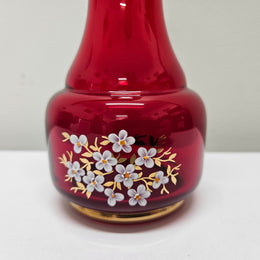 Lovely Bohemian ruby red glass vase with hand painted flowers and a guilt trimmings. It is in good original condition. Please see photos as they form part of the description.