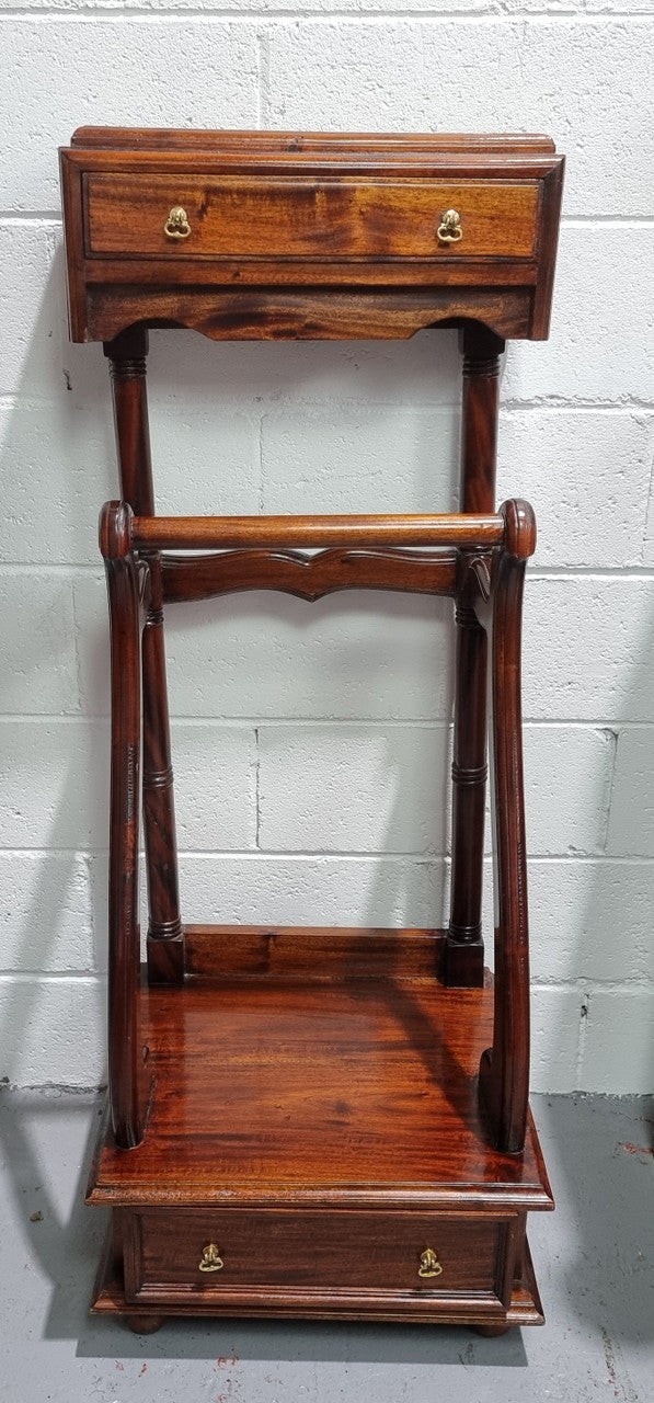 Very useful reproduction Mahogany valet stand in good condition.